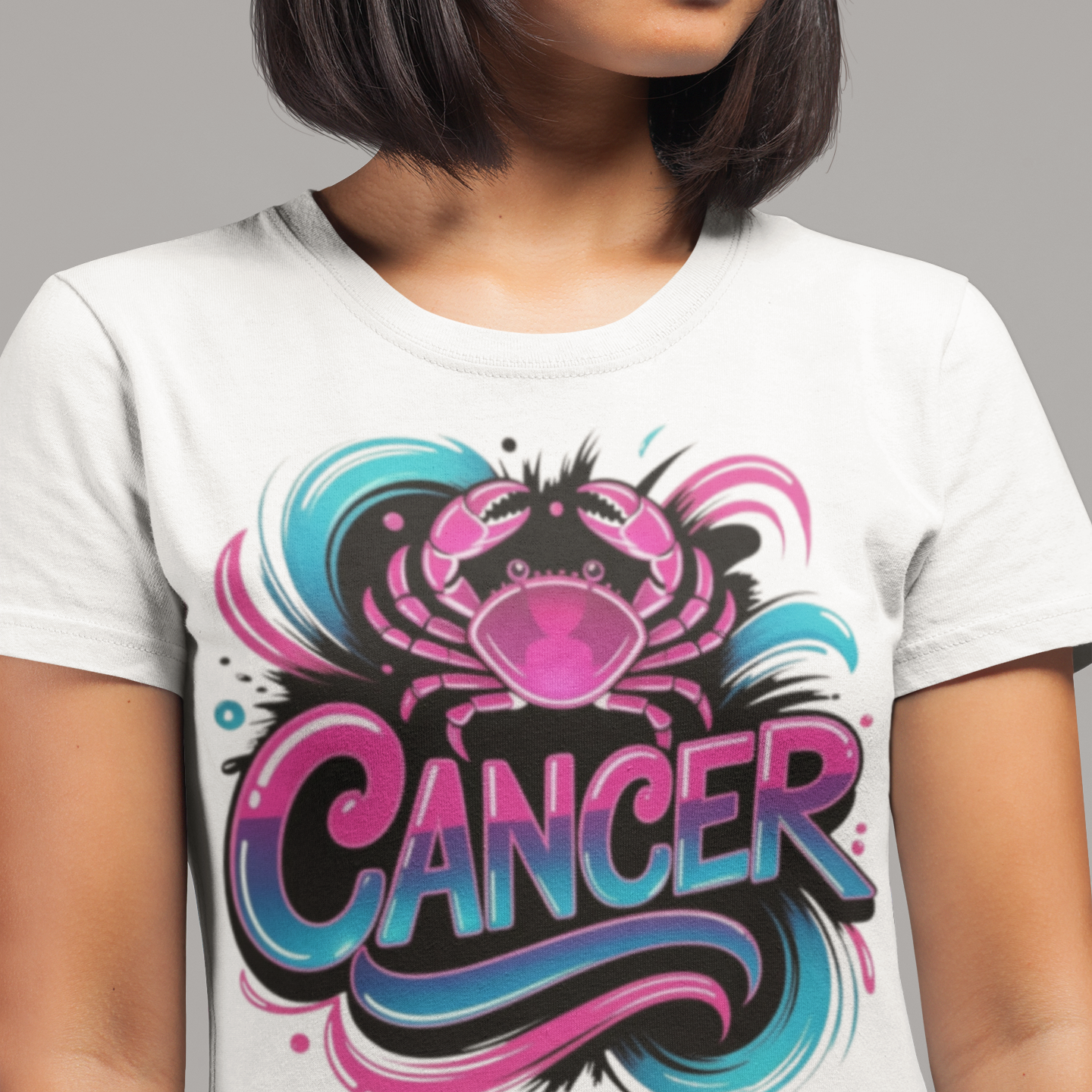 Person wearing a white t-shirt with a colorful 'Cancer' design on a gray background