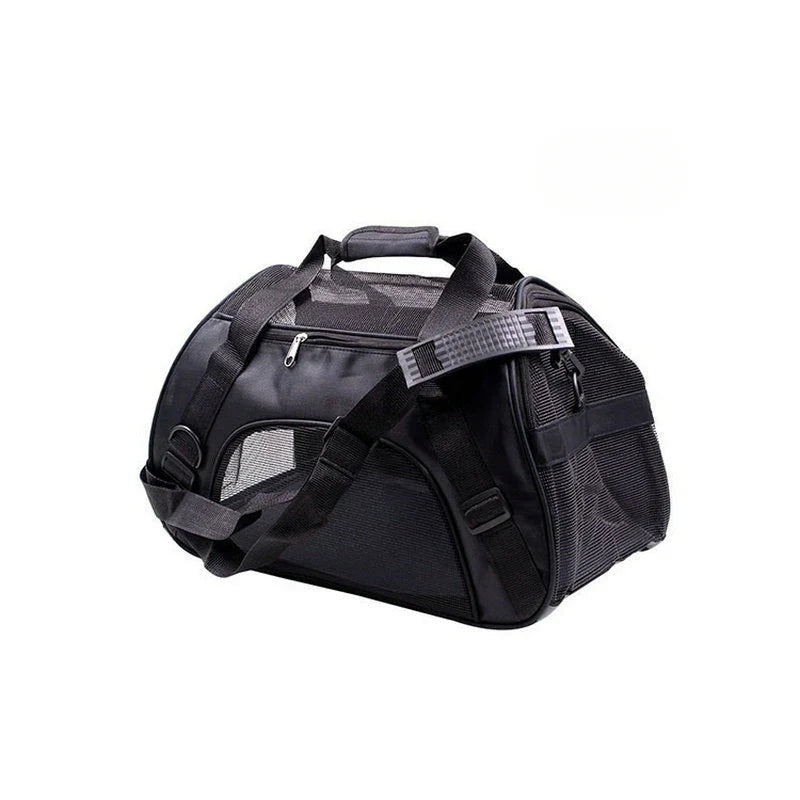 Black pet carrier with a shoulder strap on a white background