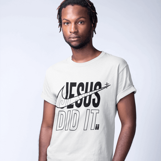 Man wearing a white t-shirt with 'Jesus did it' text on a plain background