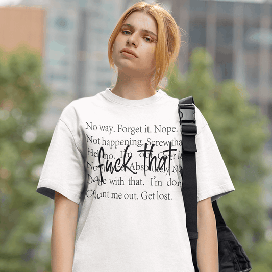 Person wearing a white t-shirt with text in an urban setting