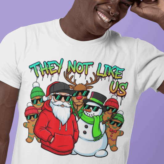 Person wearing a white t-shirt with a colorful graphic design on a purple background