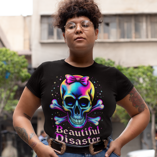 Person wearing a black t-shirt with a colorful skull design and text, standing outdoors.