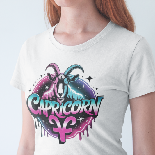 Person wearing a white t-shirt with Capricorn zodiac design