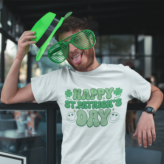 Person wearing a '#Happy St. Patrick's Day' t-shirt with green sunglasses and hat outdoors.