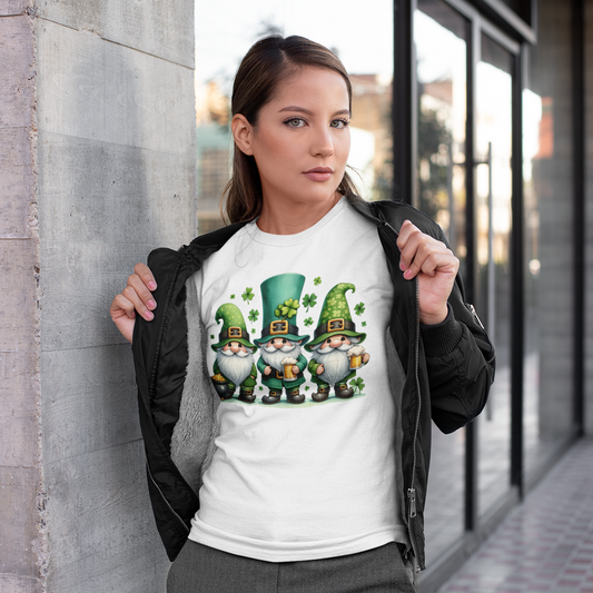 Woman wearing a white t-shirt with gnome design standing against a building.