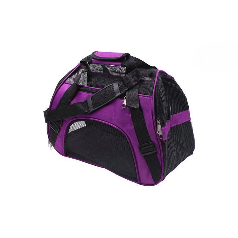 Purple and black pet carrier on a white background